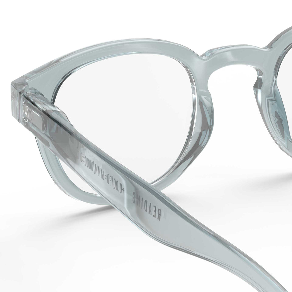 a pair of light blue reading glasses from Izipizi France