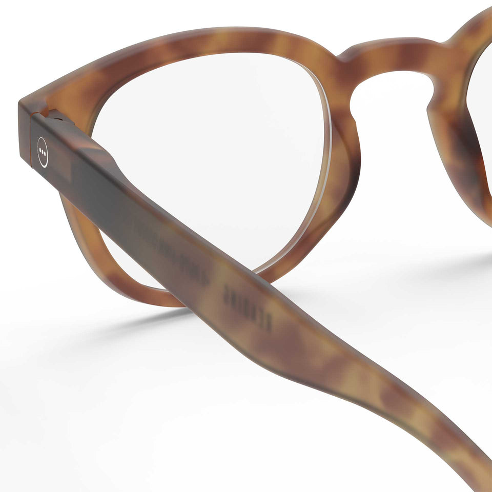 a pair of light brown reading glasses from Izipizi France