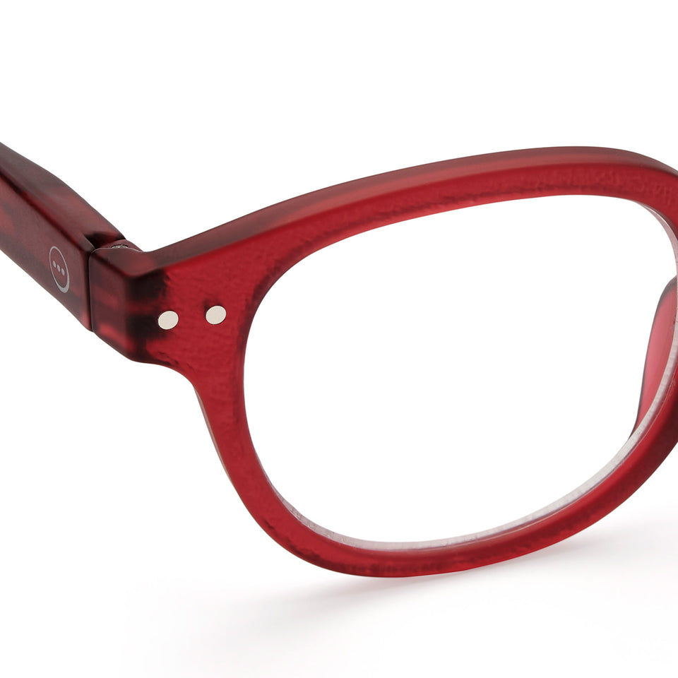 a pair of frosted rose red reading glasses from Izipizi France