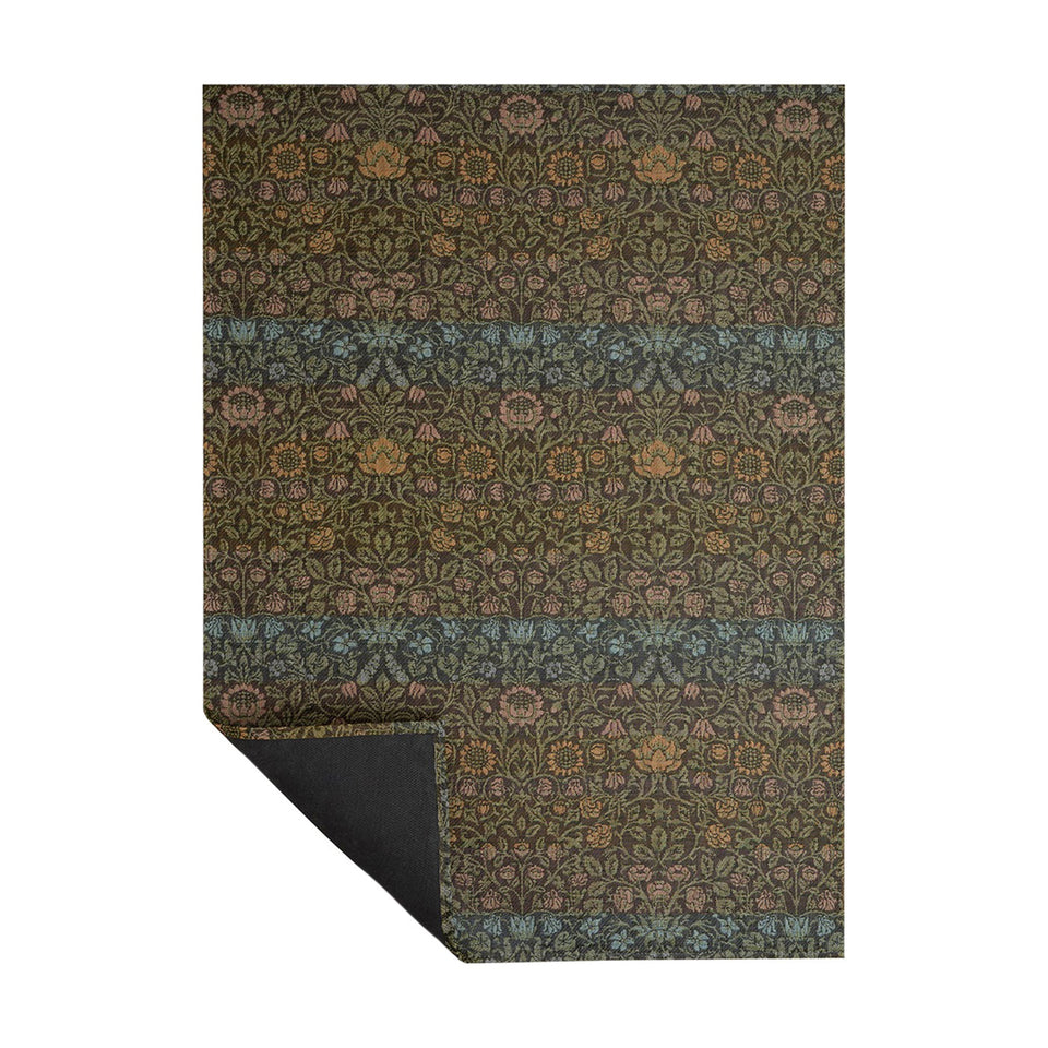 Dark Multi William Morris woven floor mat by Chilewich, folded-corner view