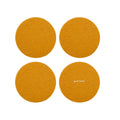 Four round felt pads in a warm mustard yellow color, arranged in a 2x2 grid on a plain white background. The bottom-right pad has the text 'graf lantz' printed in small white letters.