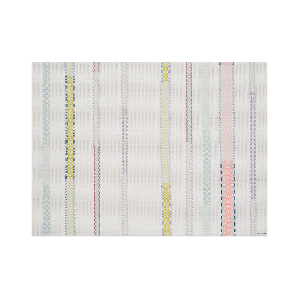 Chilewich Appliqué rectangle placemat in Almond, viewed from above on a white background