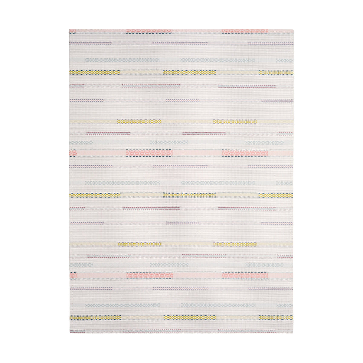 Almond Appliqué woven floor mat by Chilewich, rectangular studio view