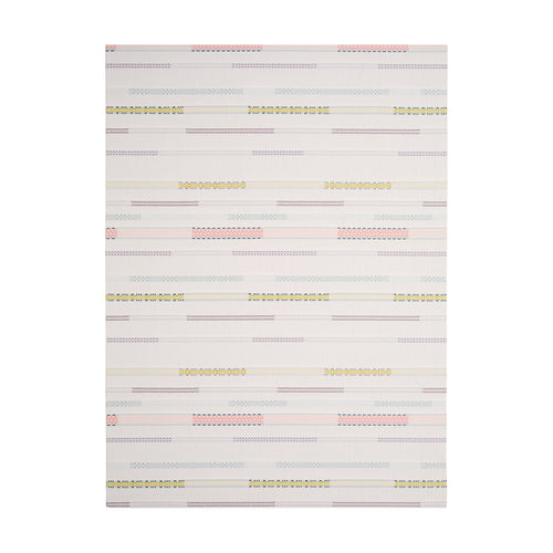 Almond Appliqué woven floor mat by Chilewich, rectangular studio view