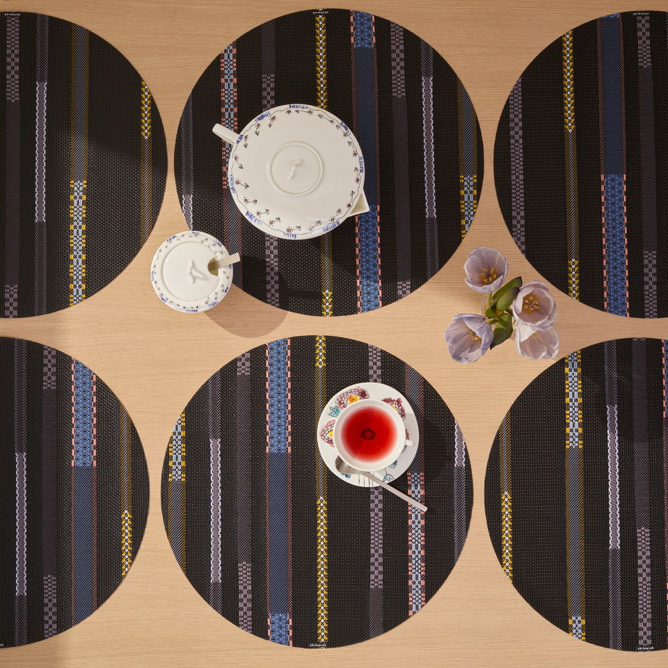 Chilewich Appliqué in Nero, shown in a styled table setting