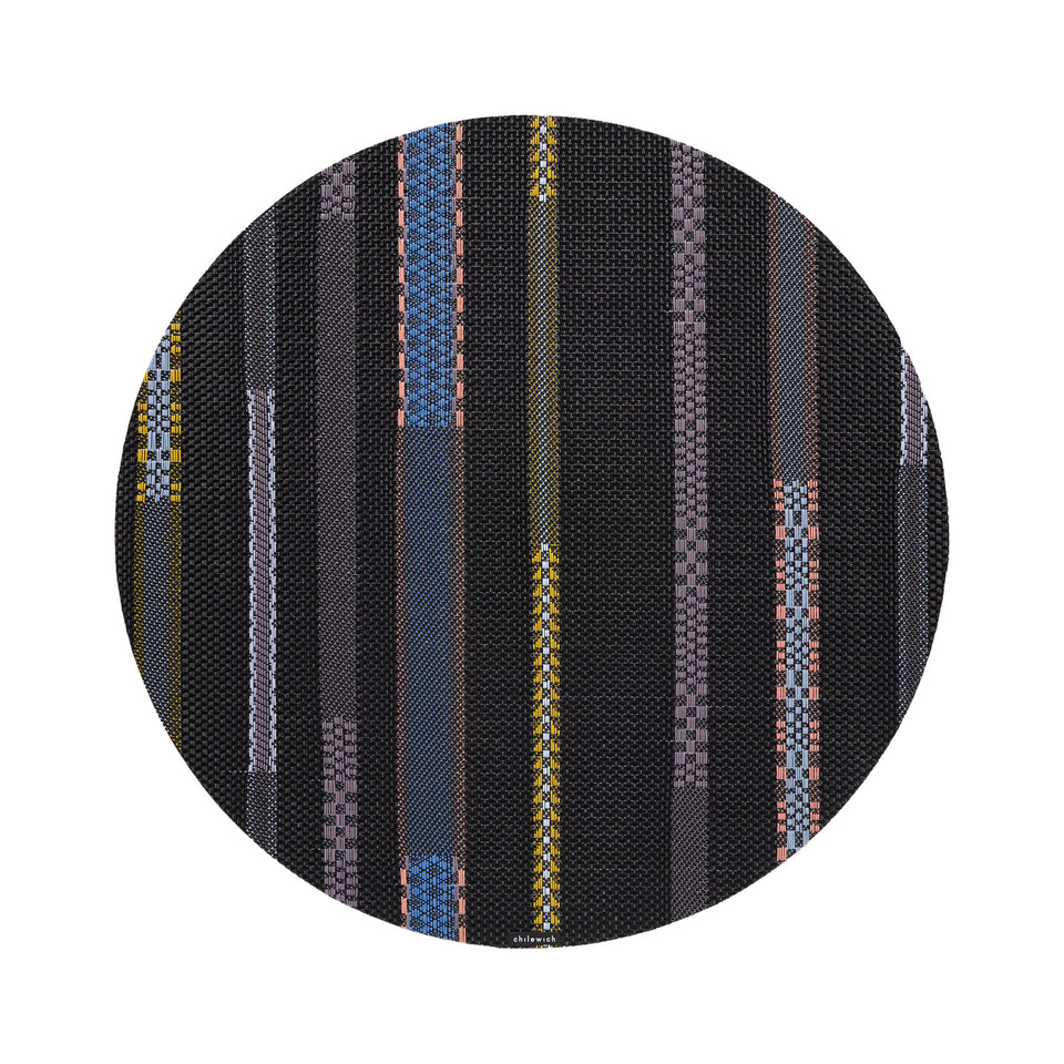 Chilewich Appliqué round placemat in Nero, viewed from above on a white background