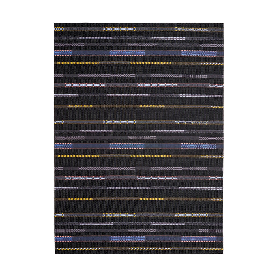 Appliqué / Nero woven floor mat by Chilewich, studio view