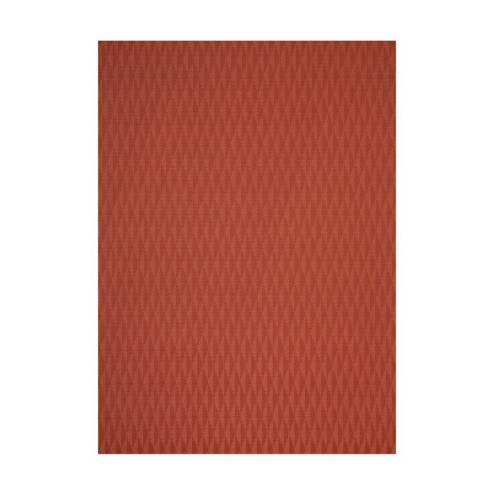 Arrow / Paprika woven floor mat by Chilewich, studio view