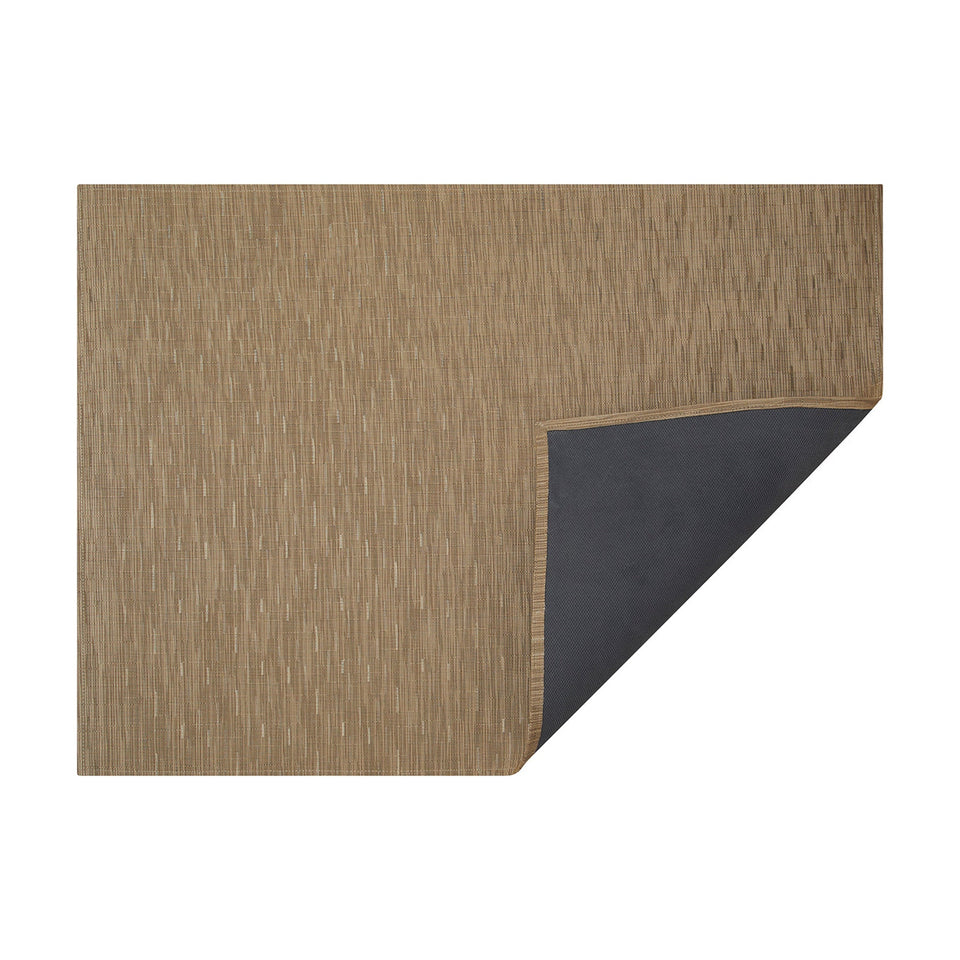 Camel Bamboo woven floor mat by Chilewich, horizontal folded-corner view
