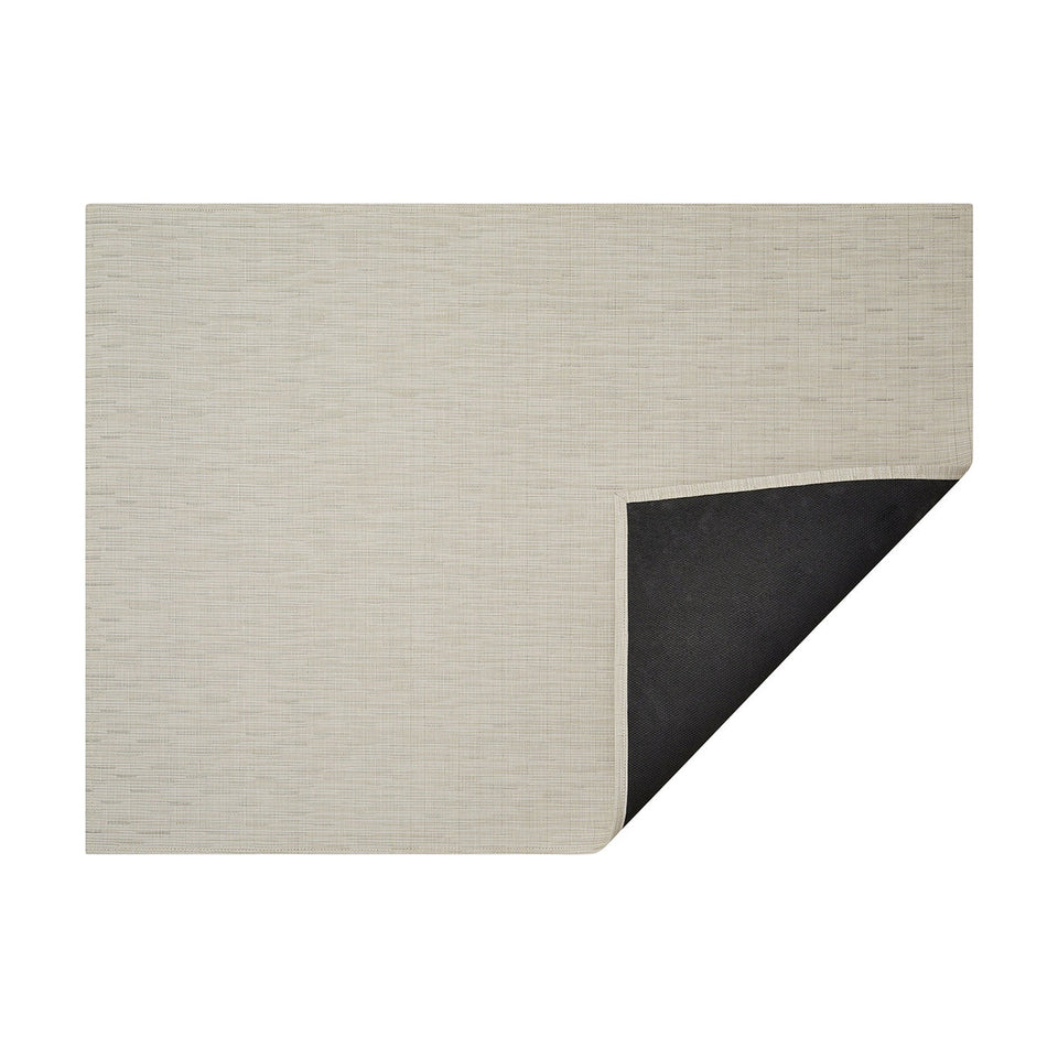 Chino Bamboo woven floor mat by Chilewich, horizontal folded-corner view