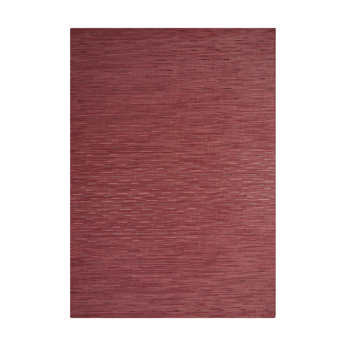 Bamboo / Cranberry woven floor mat by Chilewich, studio view