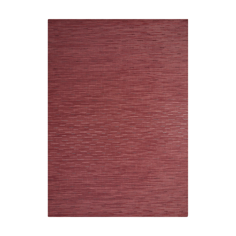 Bamboo / Cranberry woven floor mat by Chilewich, studio view