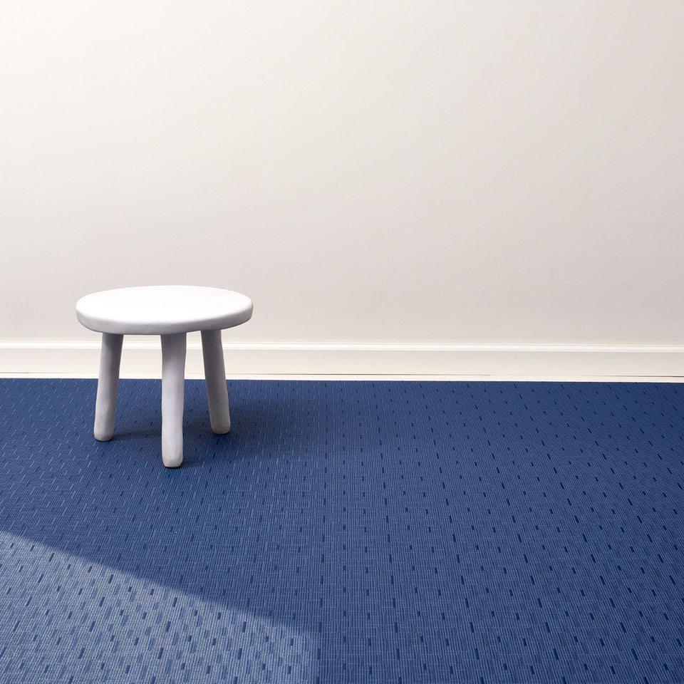 Bamboo / Lapis woven floor mat by Chilewich, interior setting