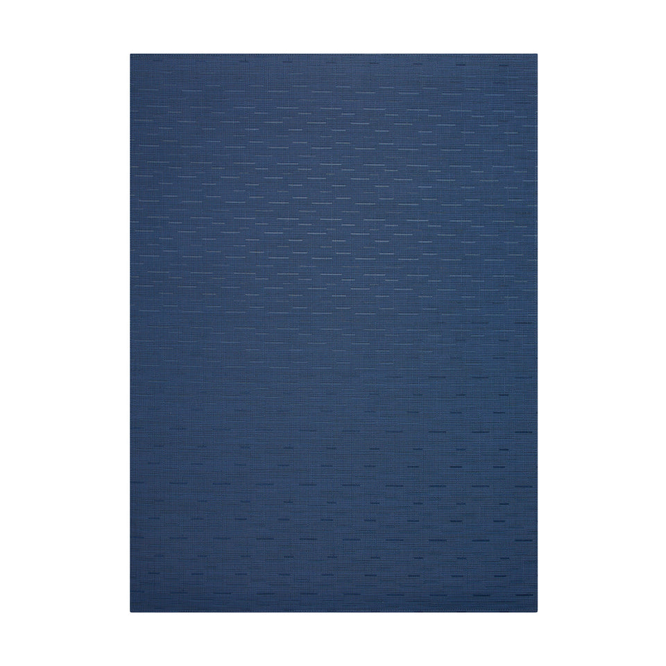 Bamboo / Lapis woven floor mat by Chilewich, studio view