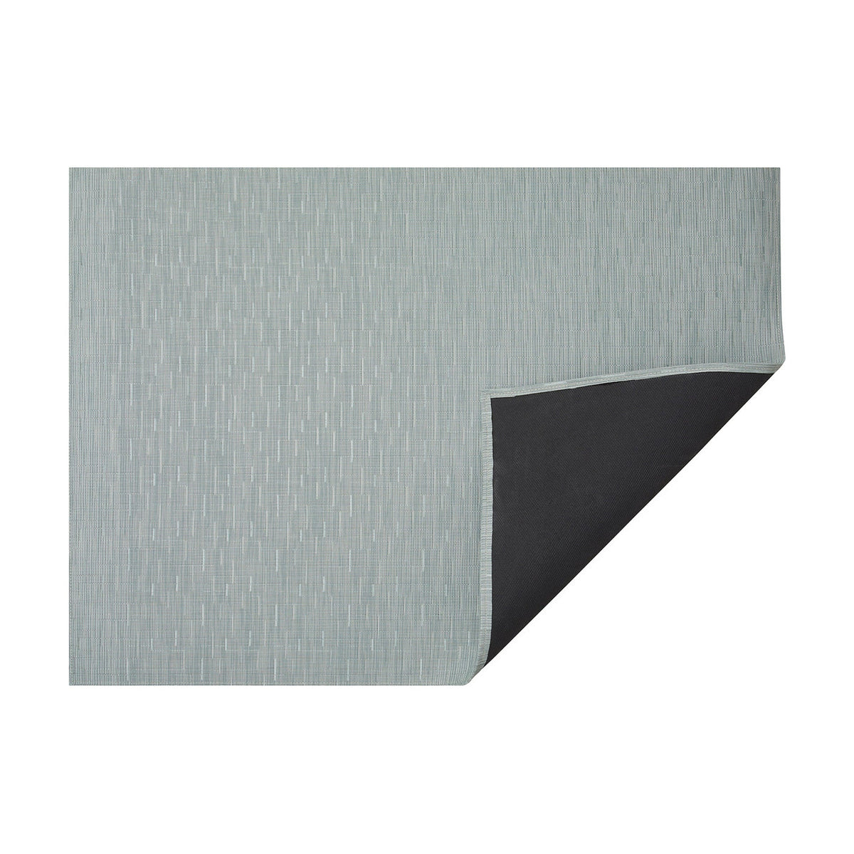 Seaglass Bamboo woven floor mat by Chilewich, horizontal folded-corner view