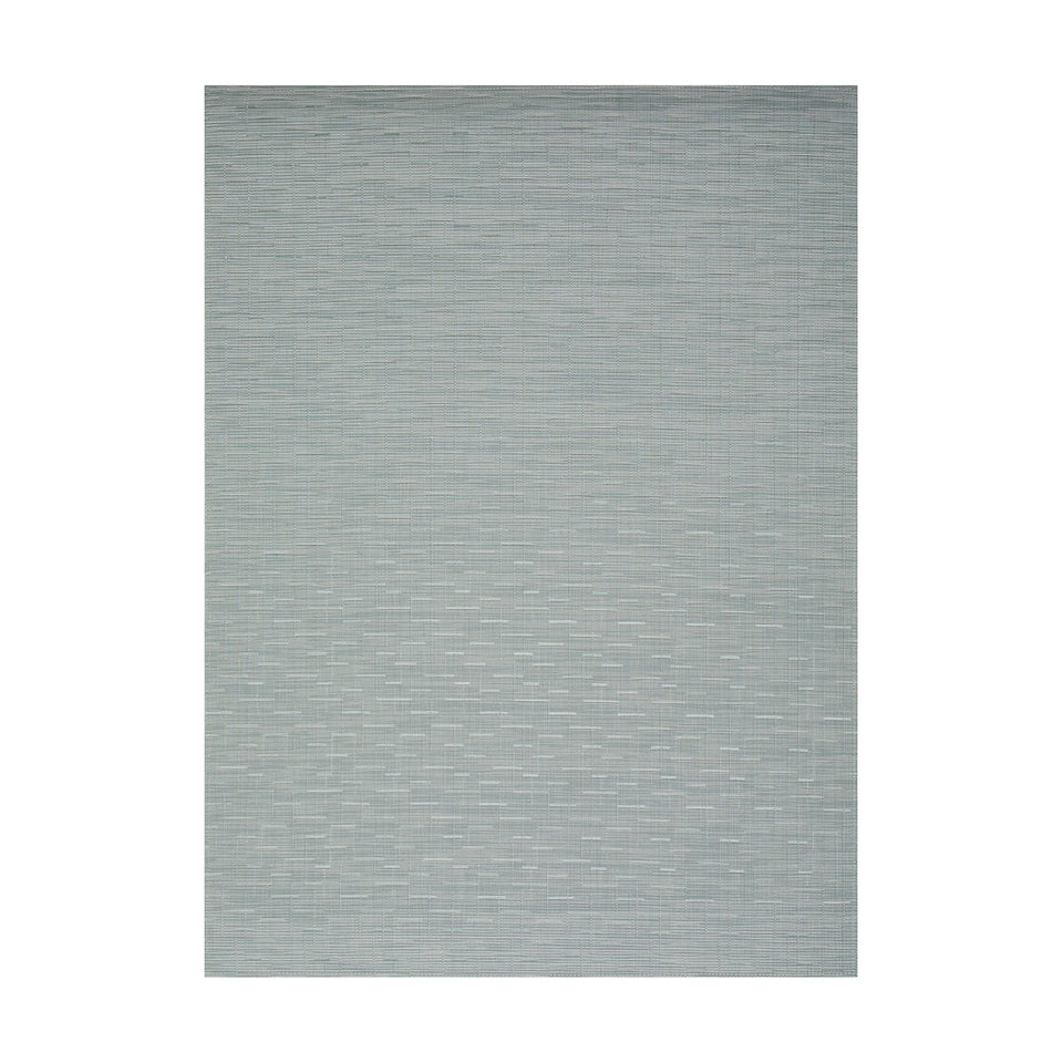 Bamboo / Seaglass woven floor mat by Chilewich, studio view