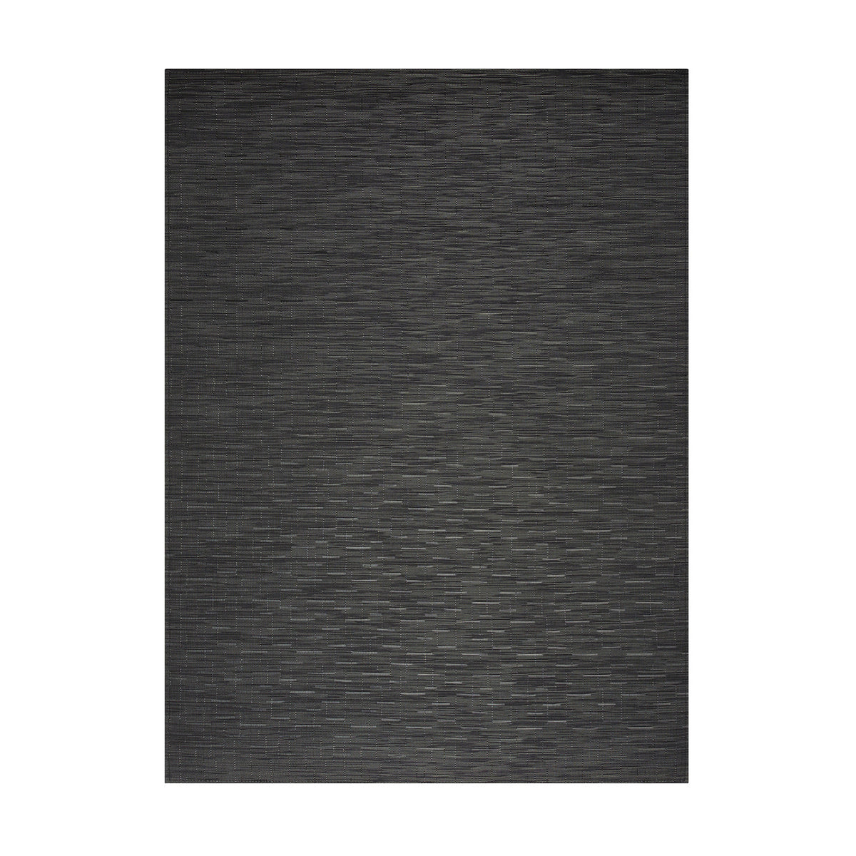 Bamboo / Smoke woven floor mat by Chilewich, studio view