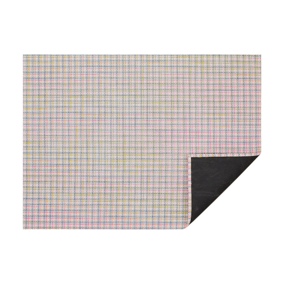 Begonia Basketweave woven floor mat by Chilewich, horizontal folded-corner view