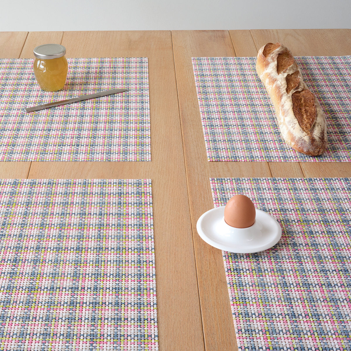 Chilewich Basketweave in Begonia, shown in a styled table setting