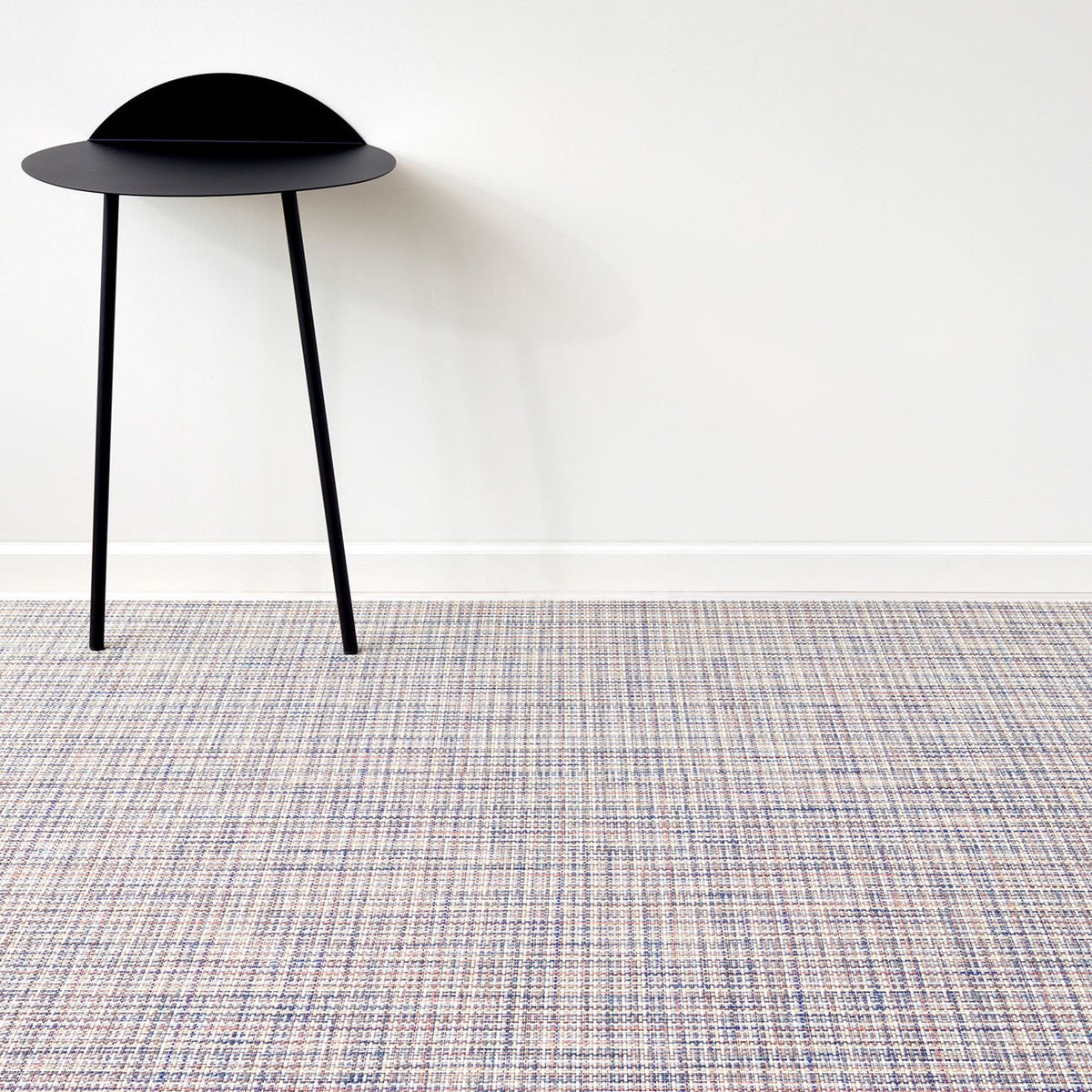 Basketweave / Bon Bon woven floor mat by Chilewich, interior setting