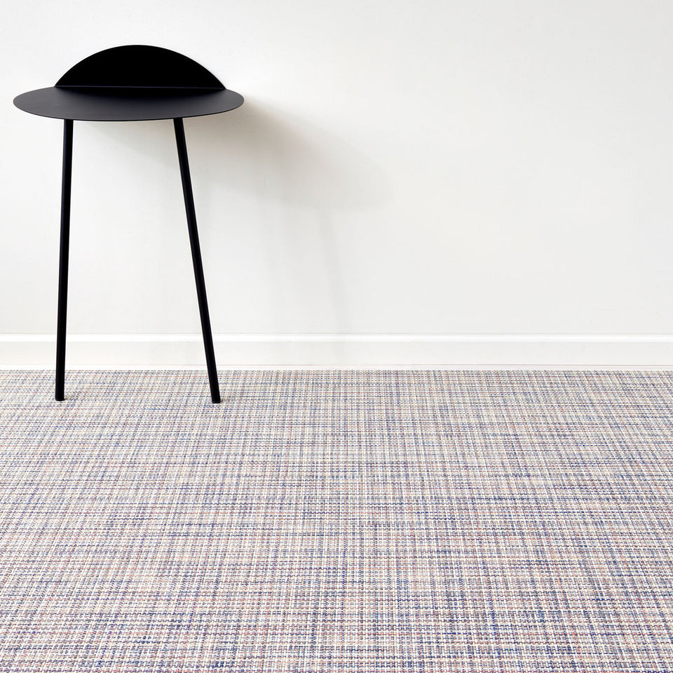 Basketweave / Bon Bon woven floor mat by Chilewich, interior setting