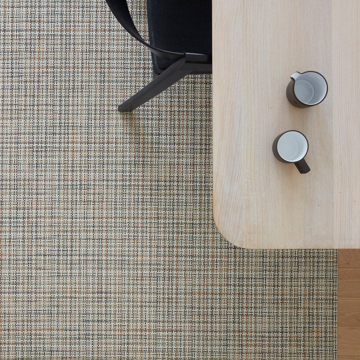 Basketweave / Bon Bon woven floor mat by Chilewich, interior setting