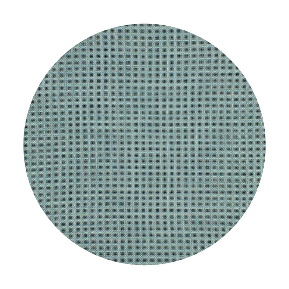Basketweave / Celadon woven floor mat by Chilewich, studio view