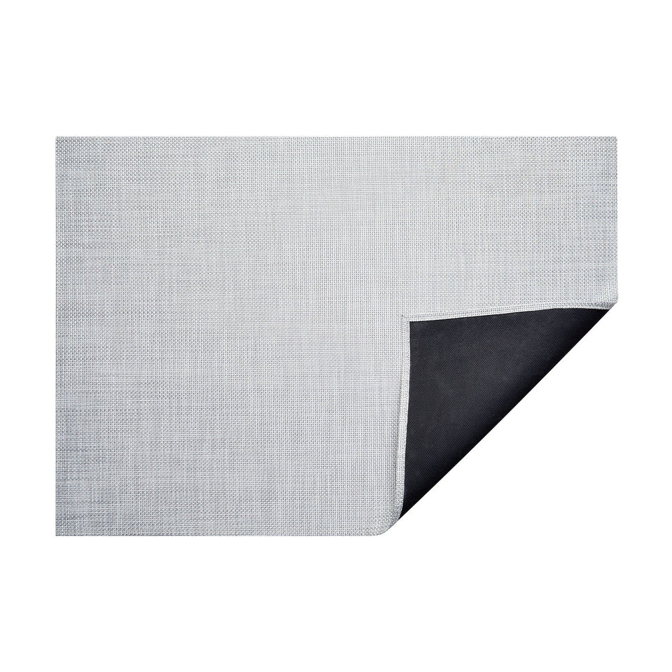 White/Silver Basketweave woven floor mat by Chilewich, horizontal folded-corner view