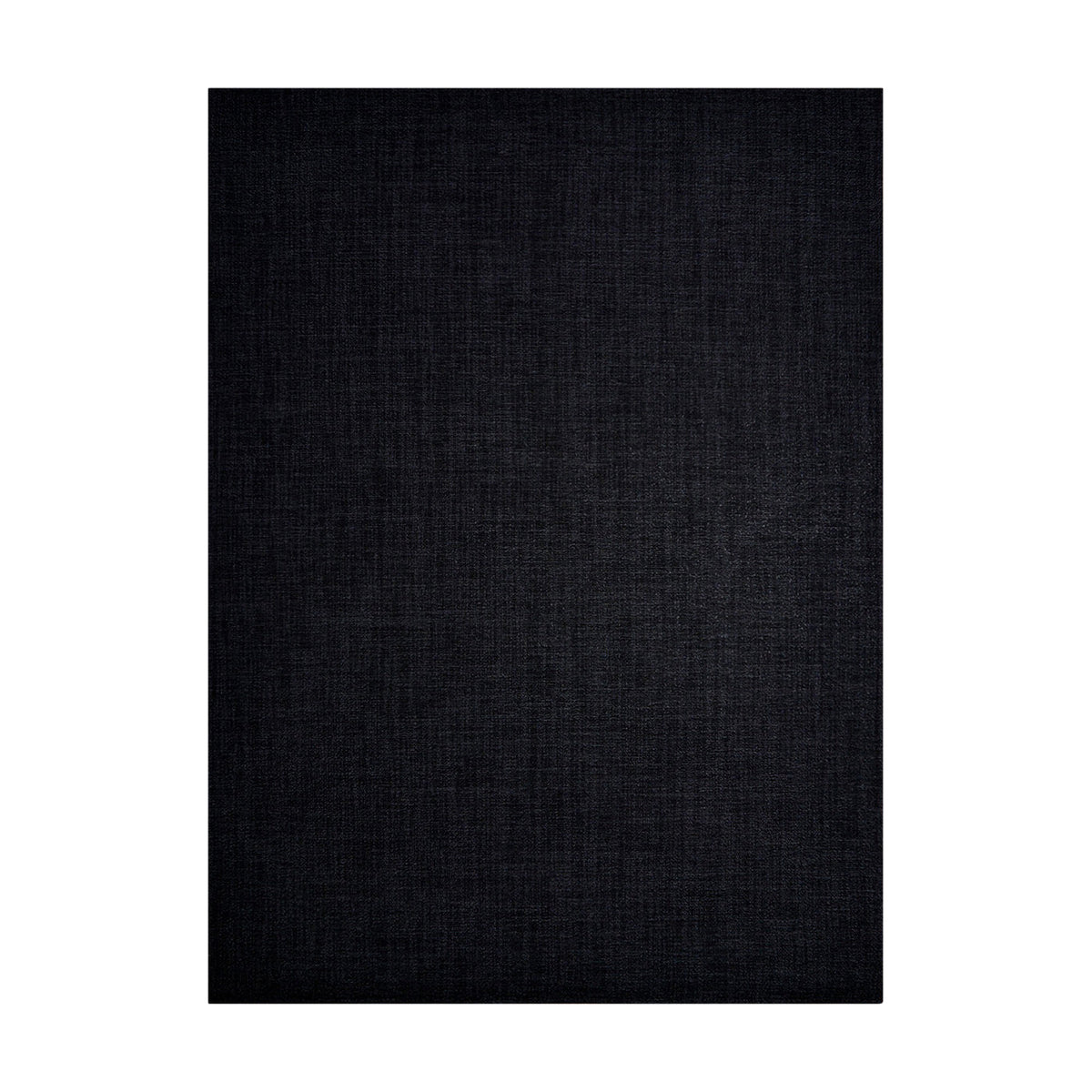 Bouclé / Noir woven floor mat by Chilewich, studio view