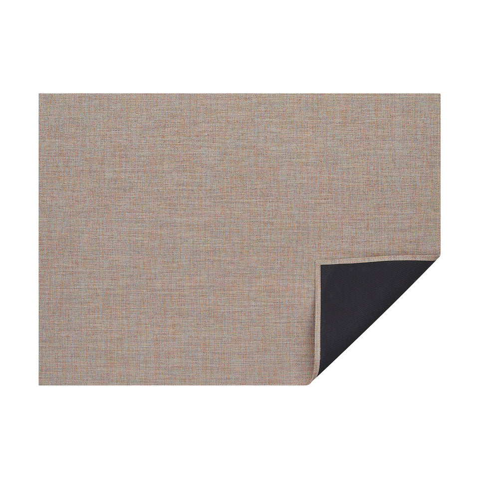 Tart Bouclé woven floor mat by Chilewich, horizontal folded-corner view