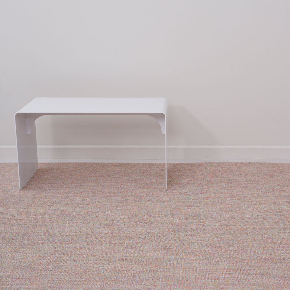 Bouclé / Tart woven floor mat by Chilewich, interior setting