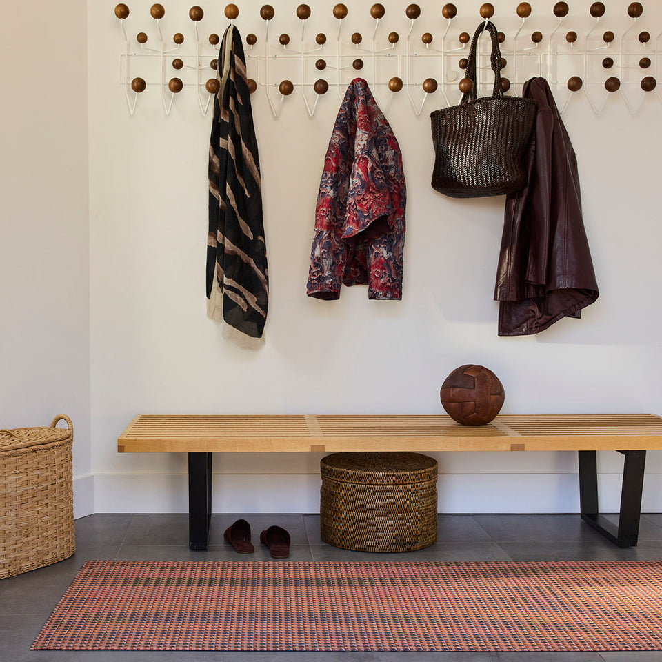 Crane / Raspberry woven floor mat by Chilewich, interior setting
