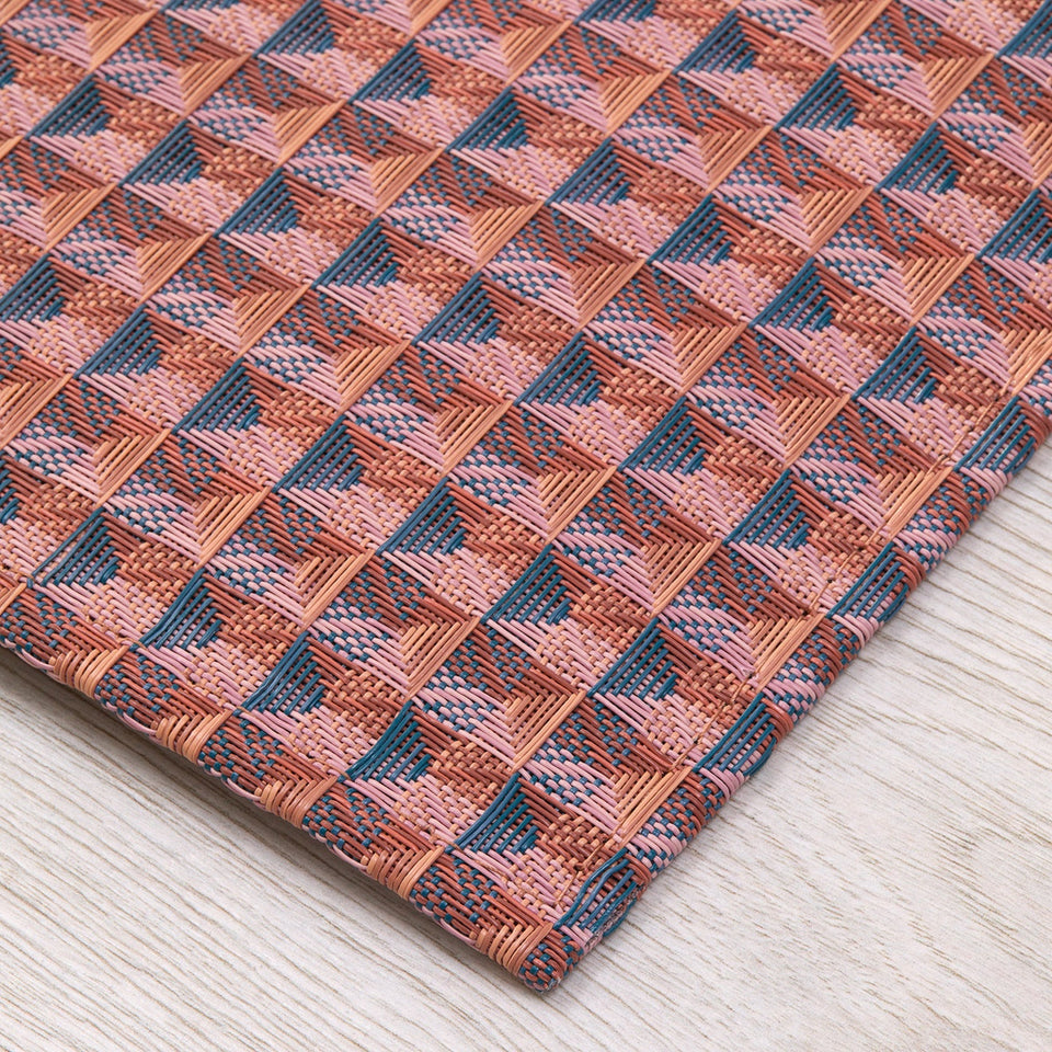 Crane / Raspberry woven floor mat by Chilewich, interior setting