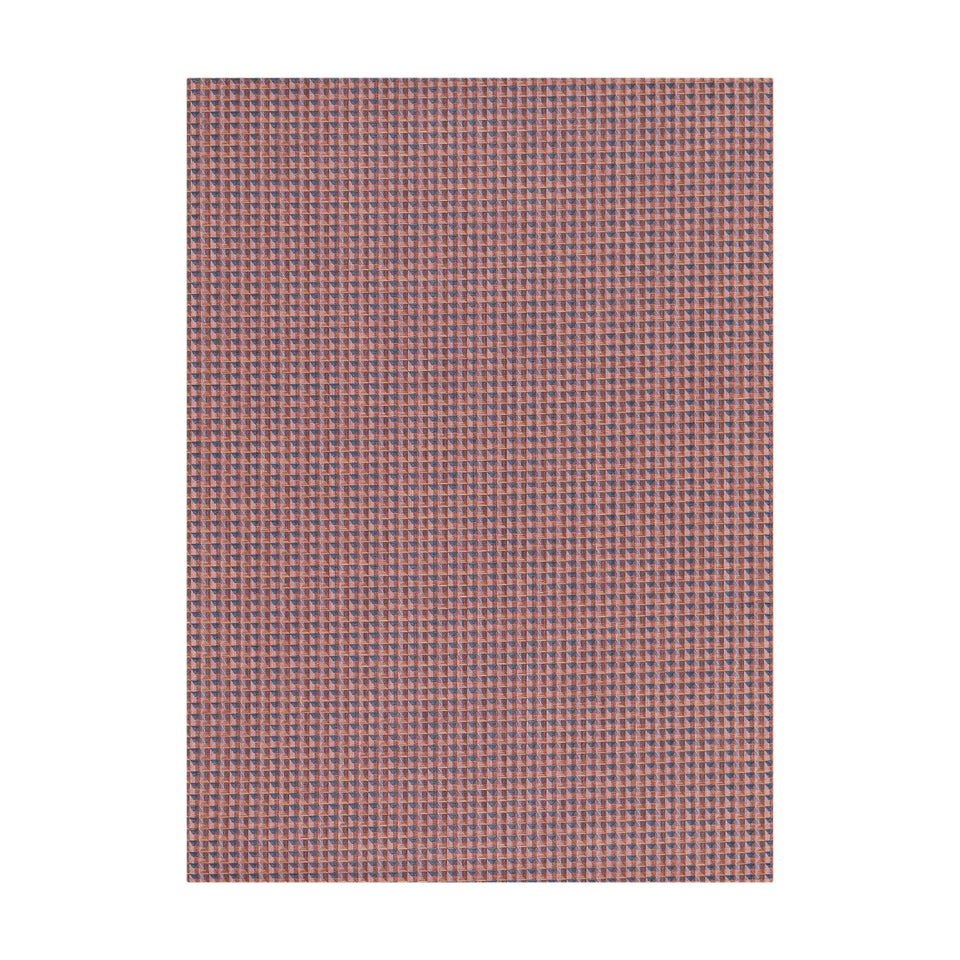 Crane / Raspberry woven floor mat by Chilewich, studio view
