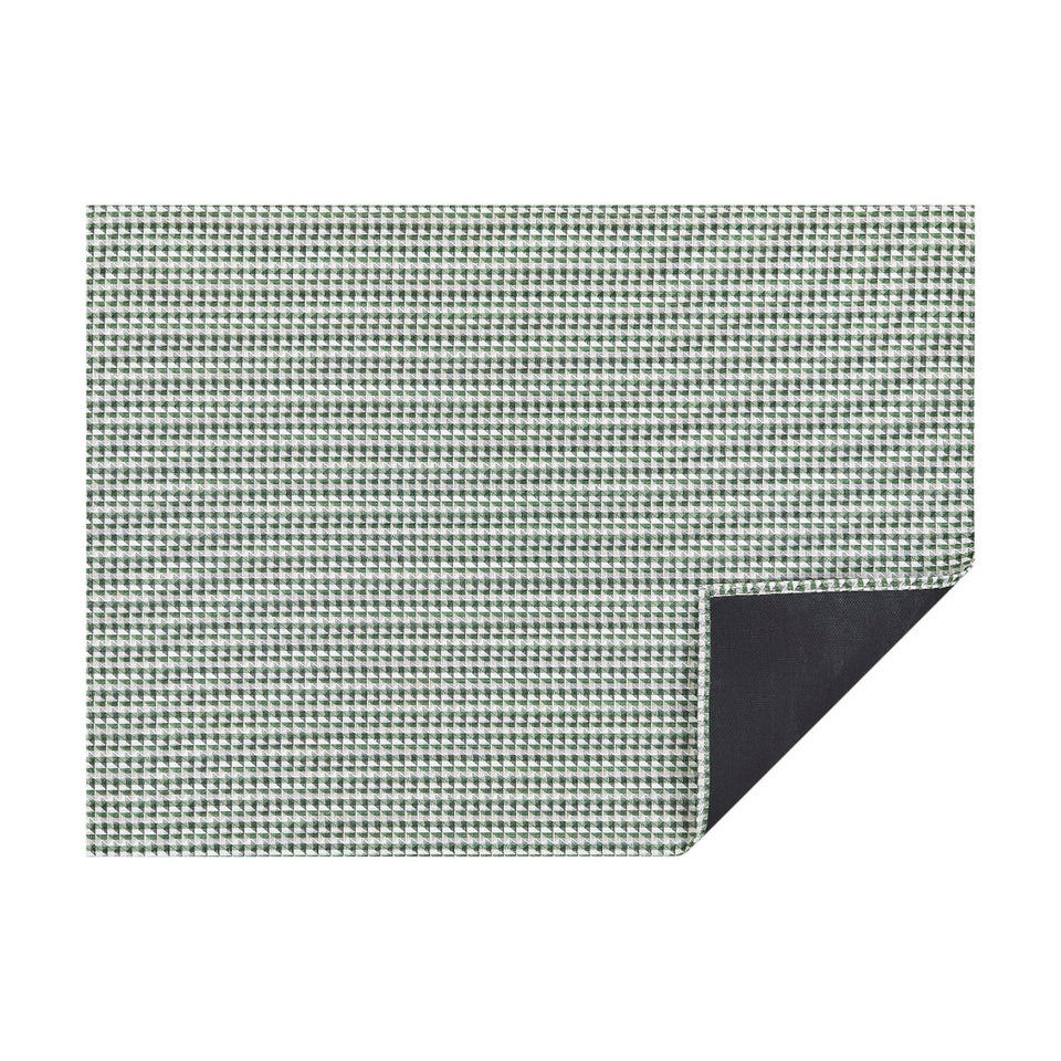Thyme Crane woven floor mat by Chilewich, horizontal folded-corner view