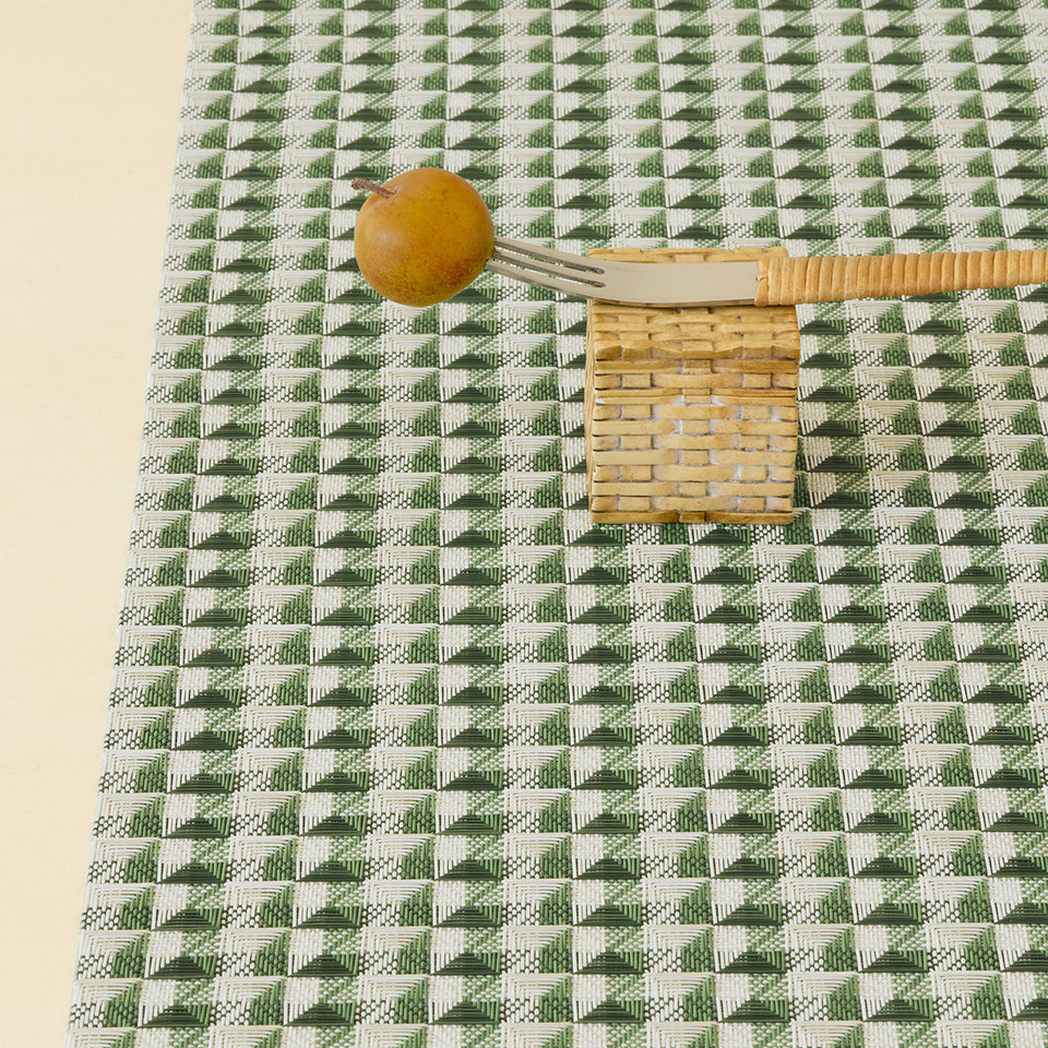 Chilewich Crane in Thyme, shown in a styled table setting