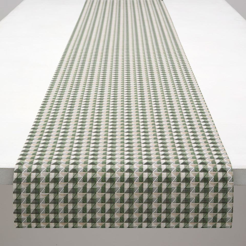 Chilewich Crane runner in Thyme, draped along a table