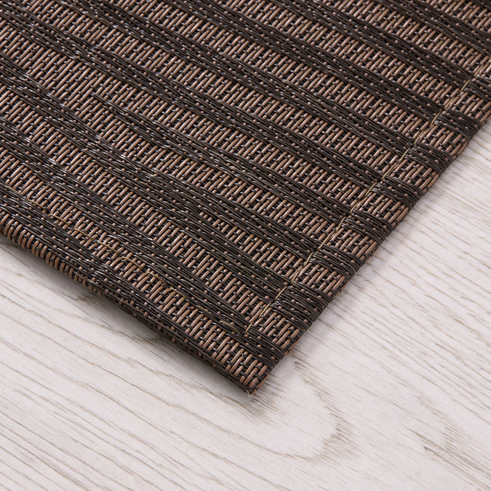 Dune / Raisin woven floor mat by Chilewich, interior setting