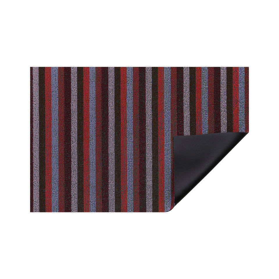 Berry Even Stripe Shag Mat by Chilewich — folded corner showing the vinyl backing