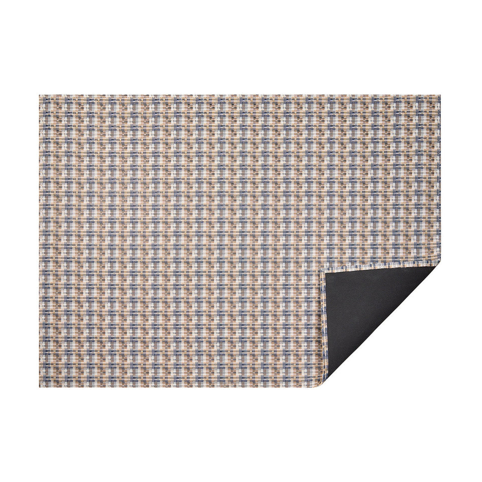 Coast Fable woven floor mat by Chilewich, horizontal folded-corner view