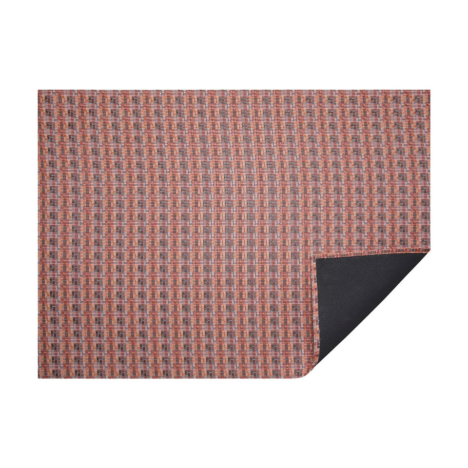 Sorbet Fable woven floor mat by Chilewich, horizontal folded-corner view