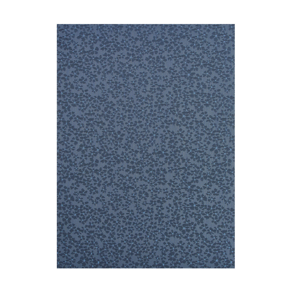 Flora / Zephyr woven floor mat by Chilewich, studio view