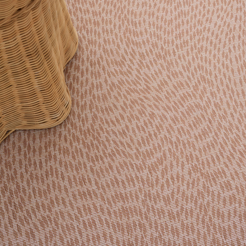 Flutter / Rosewood woven floor mat by Chilewich, interior setting