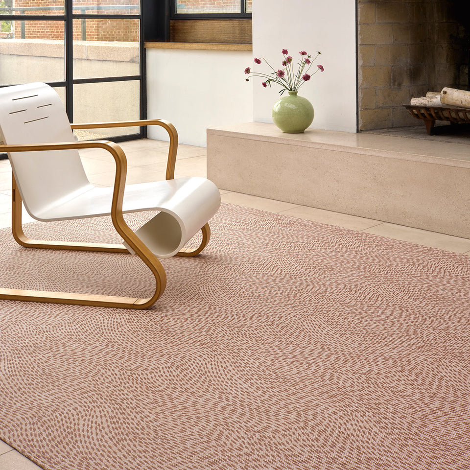 Flutter / Rosewood woven floor mat by Chilewich, interior setting