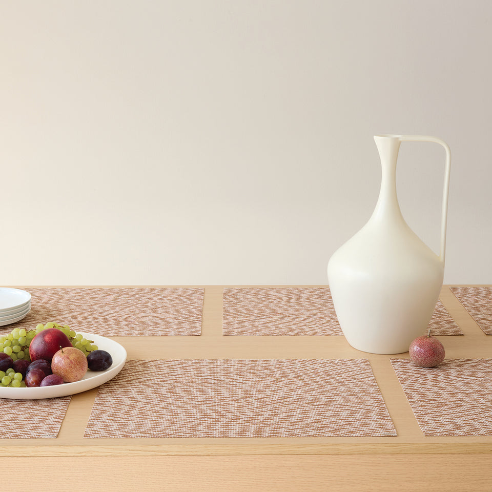 Chilewich Flutter in Rosewood, shown in a styled table setting
