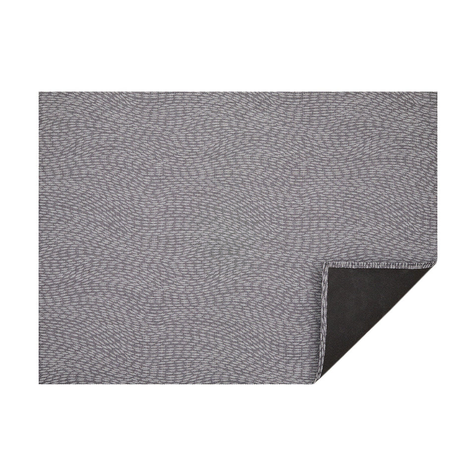 Storm Flutter woven floor mat by Chilewich, horizontal folded-corner view
