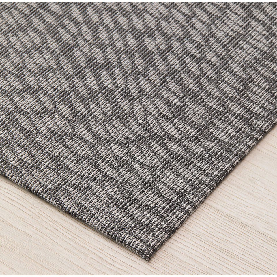 Flutter / Storm woven floor mat by Chilewich, interior setting
