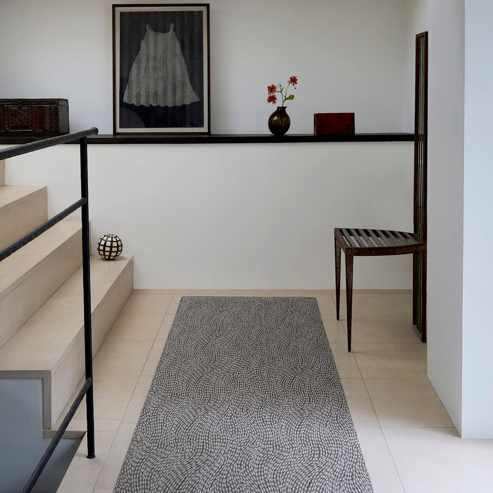 Flutter / Storm woven floor mat by Chilewich, interior setting
