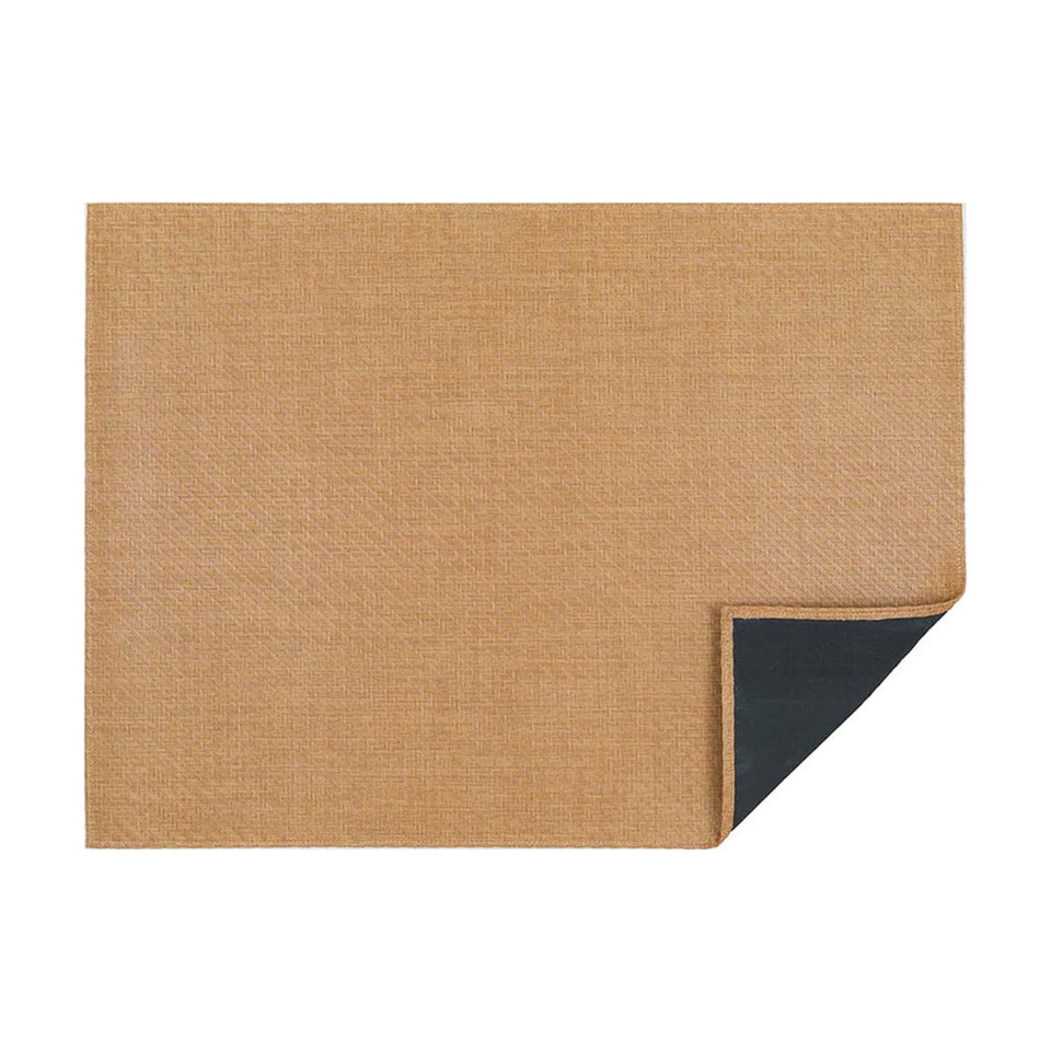 Honey Foxtail woven floor mat by Chilewich, horizontal folded-corner view
