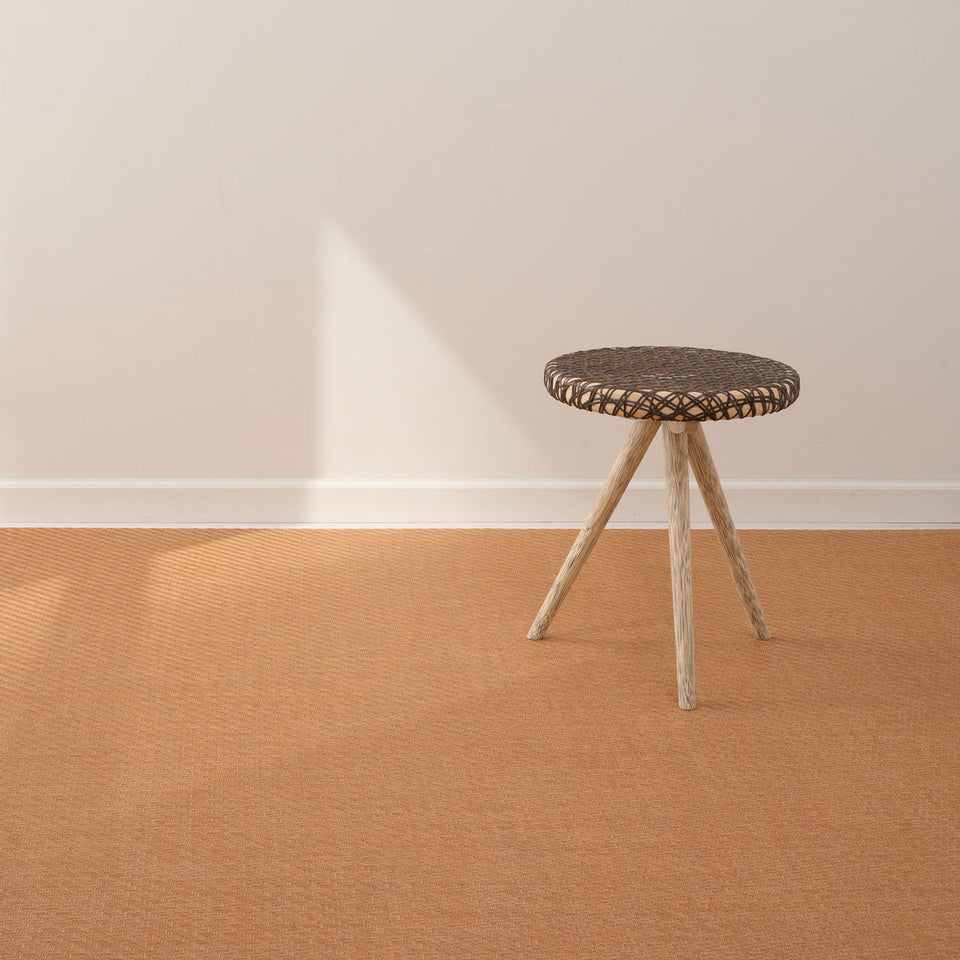 Foxtail / Honey woven floor mat by Chilewich, interior setting